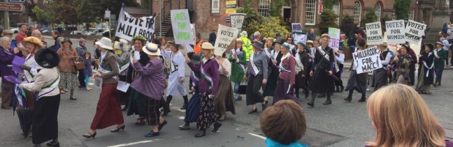 Suffragetter at Barnaby Parade - part of Barnaby Festival 2018, Macclesfield